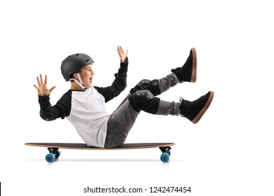 Full length profile shot of a happy boy with helmet sitting on a longboard and riding isolated on white background - Powered by Shutterstock