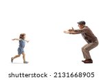 Full length profile shot of a little girl running towards an elderly man with open arms isolated on white background