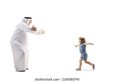 Full Length Profile Shot Of A Little Girl Running Towards An Arab Man In Ethnic Clothes Isolated On White Background