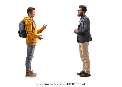 Full Length Profile Shot Of A Male Teenager Talking To A Beared Man Isolated On White Background