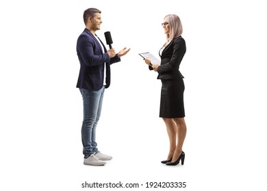 Full Length Profile Shot Of A Male Reporter Interviewing A Businesswoman Isolated On White Background