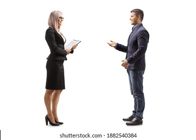 Full Length Profile Shot Of A Man Talking To A Businesswoman Holding A Clipboard Isolated On White Background