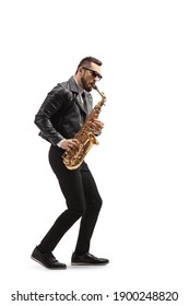 Full length profile shot of a man in a leather jacket playing a saxophone isolated on white background