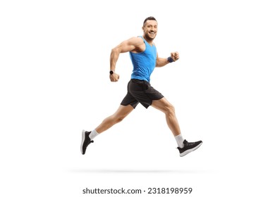 Full length profile shot of a man in sportswear running and smiling isolated on white background - Powered by Shutterstock