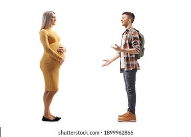 Full length profile shot of a pregnant woman and a male student talking isolated on white background