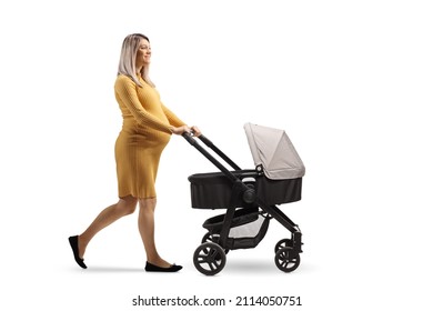 Full Length Profile Shot Of A Pregnant Woman Walking And Pushing A Stroller Isolated On White Background