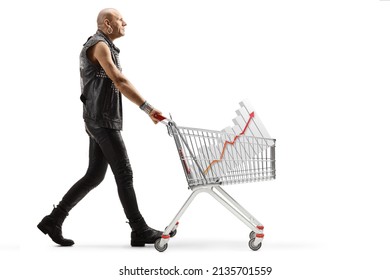 Full Length Profile Shot Of A Punk Man Pushing A Shopping Cart With A Bar Chart Diagram Inside Isolated On White Background