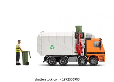 Full Length Profile Shot Of A Waste Collector With A Bin Standing Behind A Garbage Truck Isolated On White Background