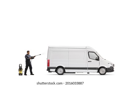 Full length profile shot of a worker in a uniform cleaning a van with a pressure washer machine isolated on white background