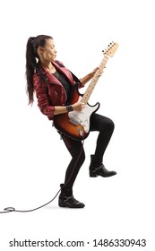 Full Length Profile Shot Of A Young Female Rock Star With A Guitar  Isolated On White Background