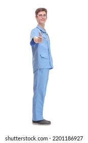 Full Length Profile Shot Of A Young Male Doctor In A Blue Uniform Standing And Waiting