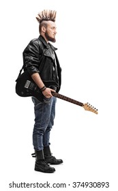 Full Length Profile Shot Of A Young Punk Rocker Holding An Electric Guitar Isolated On White Background