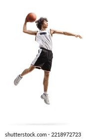 Full Length Shot Of A Basketball Player Up In The Air In A Slam Dunk Pose Isolated On White Background