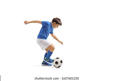 Full Length Shot Of A Boy In A Blue Jersey Playing Football Isolated On White Background