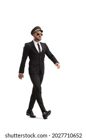 Full Length Shot Of A Chauffeur Walking Fast Isolated On White Background