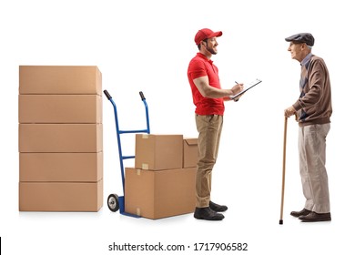 Full Length Shot Of A Delivery Guy With A Document Handing Boxes To An Elderly Man Isolated On White Background 