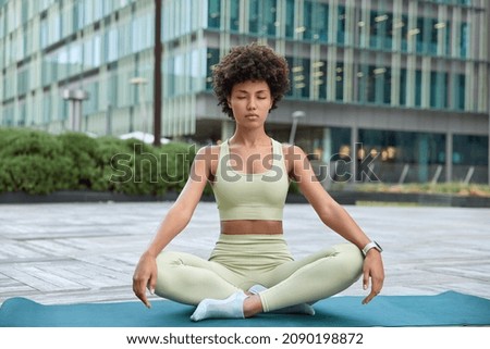 Similar – Image, Stock Photo Sportswoman posing with crossed arms