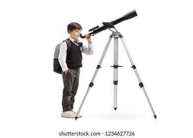 Full Length Shot Of A Schoolboy In A Uniform Looking Through A Telescope Isolated On White Background