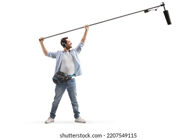 Full Length Shot Of Sound Engineer Holding A Microphone On Stage Isolated On White Background