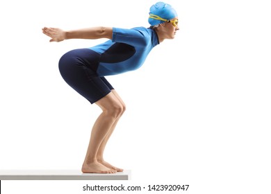 Full length shot of a woman swimmer in a wetsuit getting ready to jump isolated on white background - Powered by Shutterstock