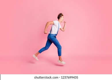 Full length size body legs photo portrait of amazed astonished delightful handsome with modern hairstyle guy running away isolated on pastel bright background copy space - Shutterstock ID 1237699435