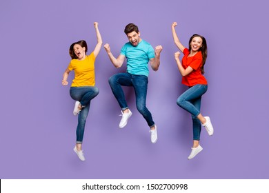 Full Length Size Body Photo Of Three Group Of People One Handsome Crazy Guy And Two Beautiful Emotional Ladies Celebrating Triumph Isolated Violet Background
