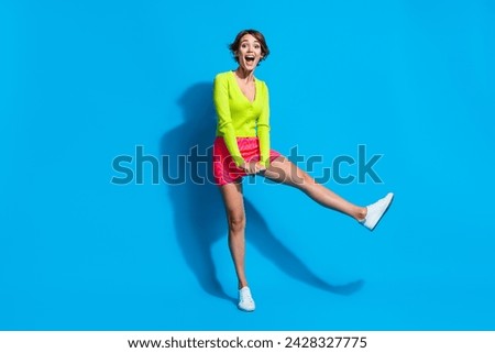 Full length size body photo of young energetic girlfriend celebrate drunk party active motion isolated on aquamarine color background