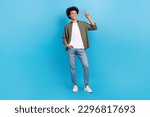Full length size cadre of young cheerful man wear casual trendy clothes show v-sign model stylish outfit isolated on blue color background