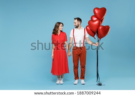 Similar – Image, Stock Photo Couple holding hands and dancing on a rooftop