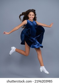 Full length teenager with movement dress. Young teen child with flowing skirt. Teen girl fluttering dress in motion, isolated on gray. - Shutterstock ID 2196203985
