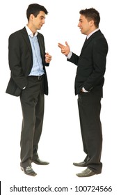 Full Length Of Two Business Men Having Conversation Together Isolated On White Background