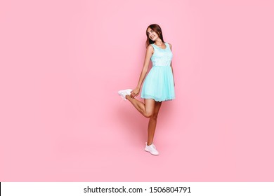 Full length, young beautiful pensive girl in dress looking at copy space on pink background - Shutterstock ID 1506804791