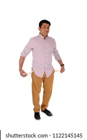 A Full Lengths Image Of An Asian Man Showing The Empty
Pockets He Is A Very Poor Man, Isolated For White Background
