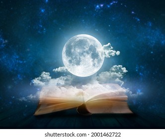 Full moon above open pages of old book; Astrology, zodiac, esoteric concept - Shutterstock ID 2001462722