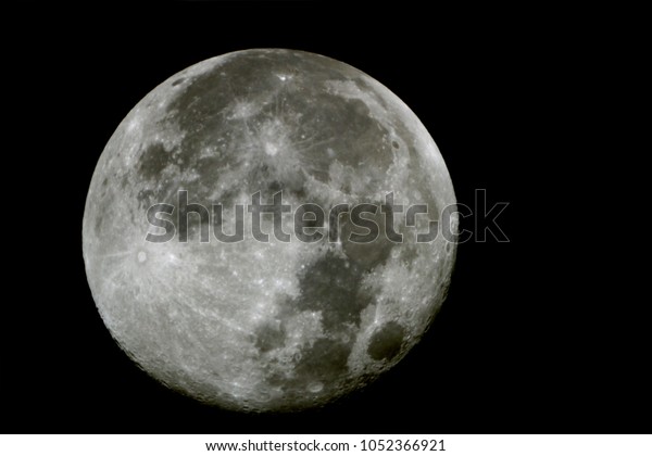 Full moon as background / The Moon is an
astronomical body that orbits planet Earth, being Earth's only
permanent natural satellite. It is the fifth-largest natural
satellite in the Solar
System