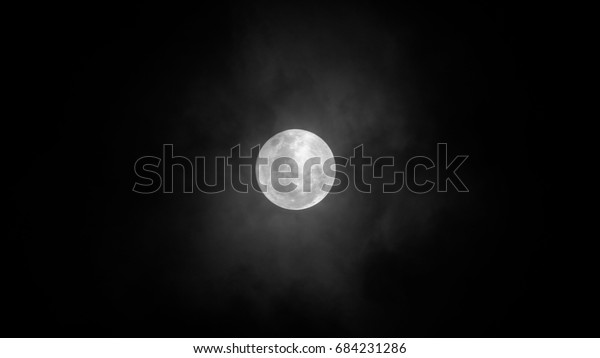 Full Moon Background / A full moon is the lunar\
phase that occurs when the Moon is completely illuminated as seen\
from Earth