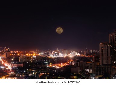 Full moon Bangkok night view with skyscraper in business district in Bangkok Thailand - Shutterstock ID 671632324