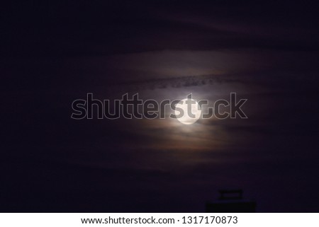 Similar – Image, Stock Photo Moon behind veil clouds