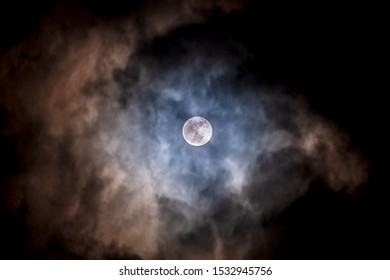 Full moon black background with clouds detail surface