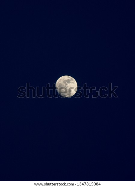Full moon in blue
sky