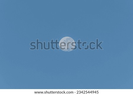 A full moon in the blue sky. Nature. Astronomy.