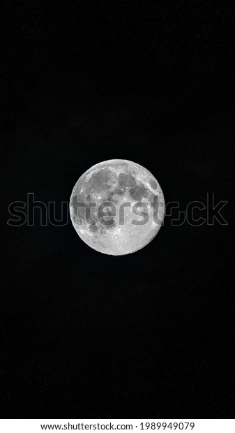 Full moon in the clear night\
sky