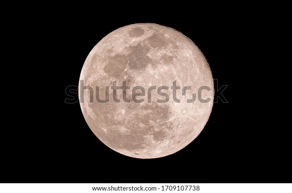 Full moon close up on night sky background,
surface moon on black background and not star in sky, moon is
planet of earth in univers