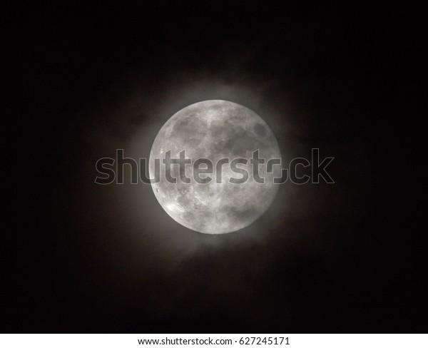 Full moon at cloudy\
night