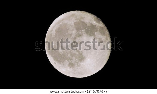 Full moon moon with\
craters and light