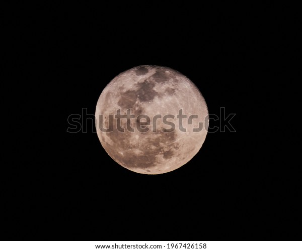 Full moon dressed in\
pink                