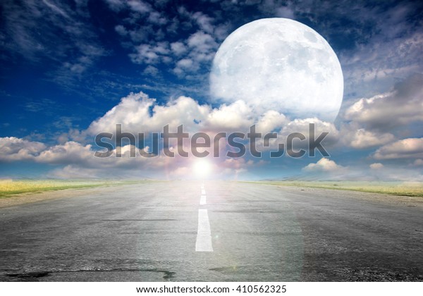 full moon and empty rural
road