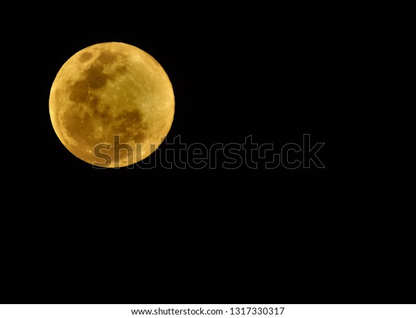 The full moon. of  Makha Bucha Day, which is a
major day in Buddhism.