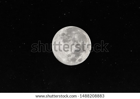 Full moon with many stars in the dark night.