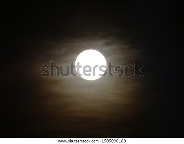full moon with mist on a\
dark night